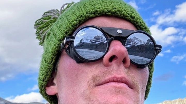 Andy Argo wearing Vallon Heron Glacier glasses