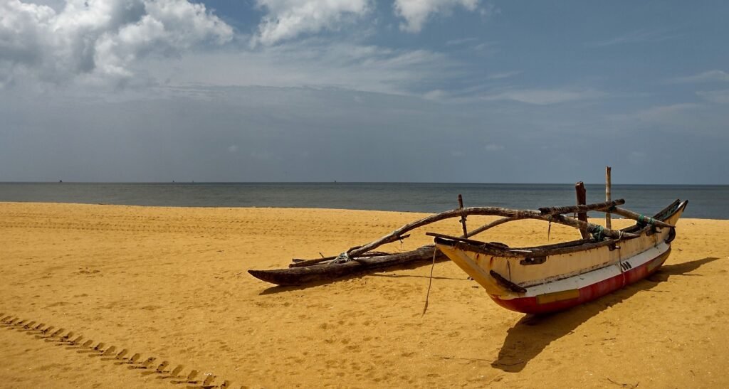 beach with boats negombo sri lanka